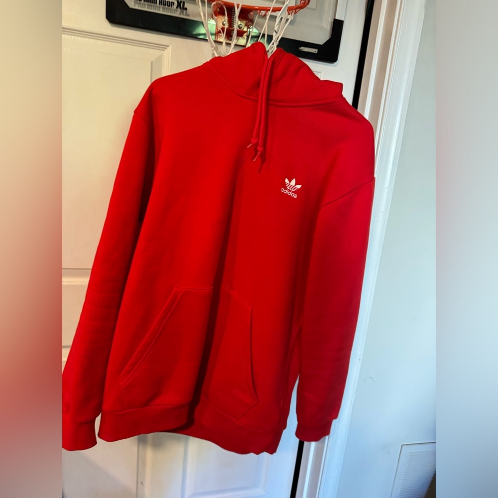 RED adidas hoodie.